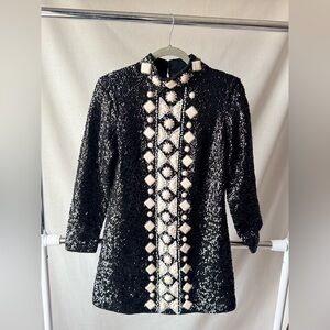 70s vintage mini dress black sequins with cream accents and rhinestones.